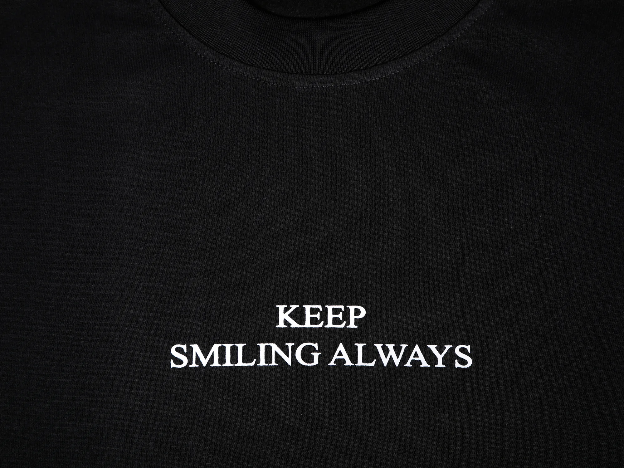 Smile Always Tshirt in Black — fabric detail